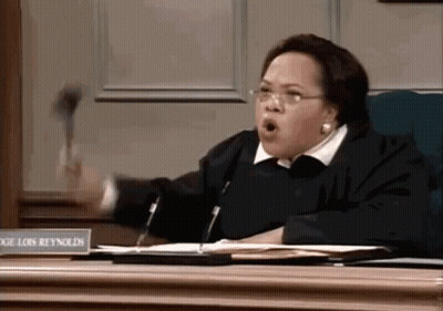 Female Judge With Name Plate Reynolds GIF