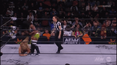 Female Referee In Wrestling Ring With AEW Logo GIF