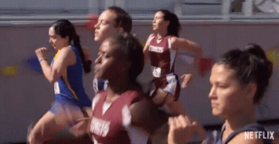 Female Runners Running On Track GIF