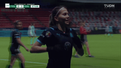 Female Soccer Player Celebrates Goal GIF