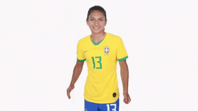 Female Soccer Player In Yellow Jersey Number 13 GIF