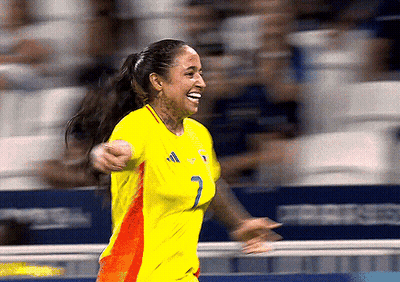 Female Soccer Player In Yellow Jersey Number 2 GIF