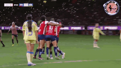 Female Soccer Players Celebrate Goal GIF
