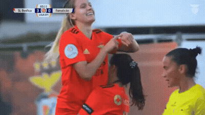 Female Soccer Players Celebrate Goal GIF