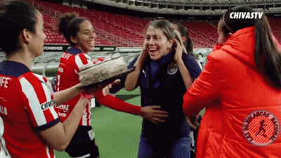 Female Soccer Players Celebrating Win GIF