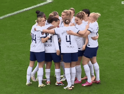 Female Soccer Players Huddled Number 4 Jersey GIF
