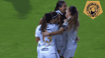Female Soccer Players Hugging Number 15 GIF