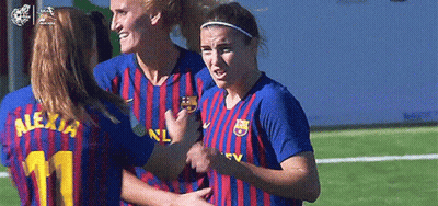 Female Soccer Players Hugging On Field GIF