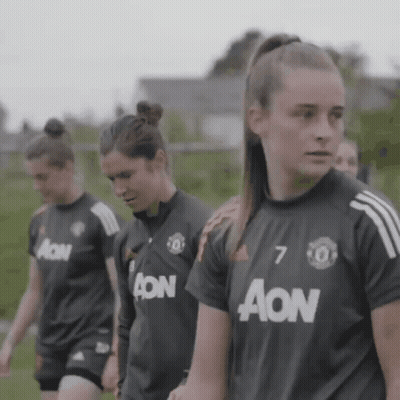 Female Soccer Players In Aon Shirts GIF