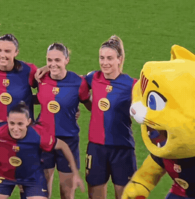 Female Soccer Players Posing With Mascot GIF