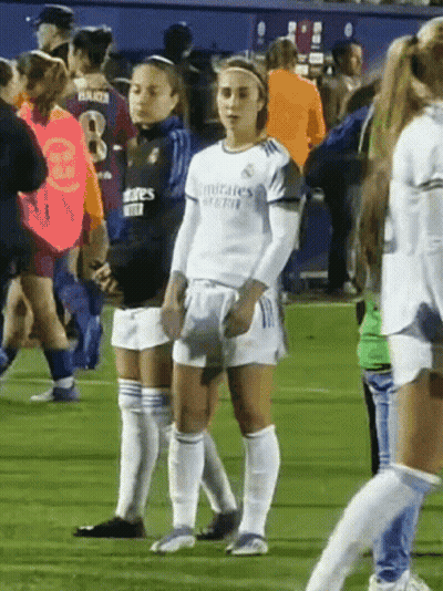 Female Soccer Players Standing On Field GIF