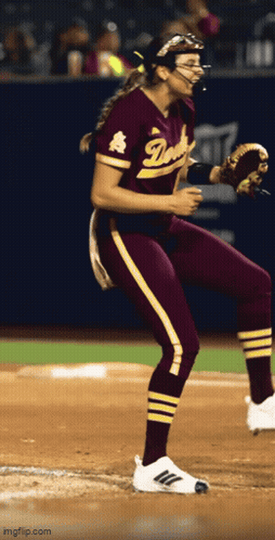 Female Softball Player In Maroon And Gold Duke Uniform GIF