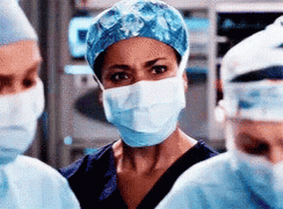 Female Surgeon Wearing Mask And Cap GIF