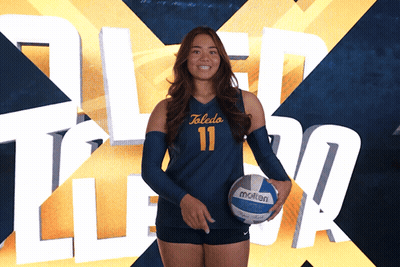 Female Volleyball Player From Toledo Holds Molten Volleyball GIF