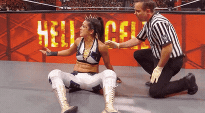Female Wrestler Helped By Referee Hell In The Cell Sign GIF