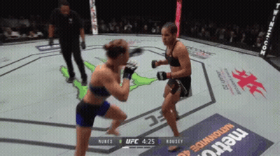 Female Wrestler Holding Belt GIF