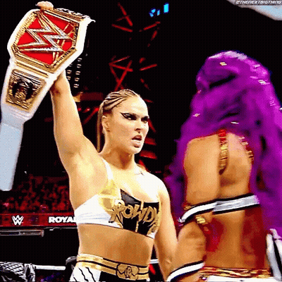 Female Wrestler Holding Belt GIF