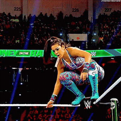 Female Wrestler Jumping Over Rope GIF