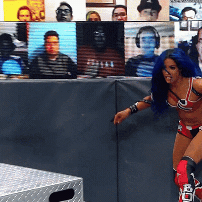 Female Wrestler With Blue Hair And BC Knee Pads GIF