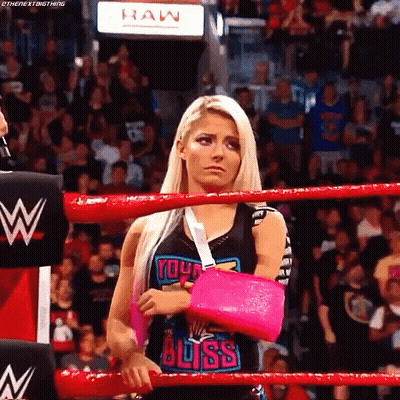 Female Wrestler With Pink Cast In Ring GIF
