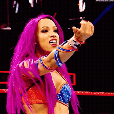Female Wrestler With Pink Hair Giving Middle Finger GIF