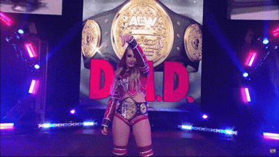 Female Wrestler With World Heavyweight Championship Belt GIF