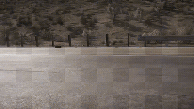 Fence Along Highway With Trees GIF