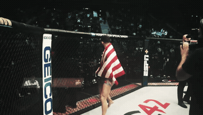 Fighter In Boxing Ring With GEICO Sign GIF