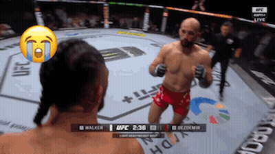 Fighter In UFC Ring With Crying Face On Head GIF