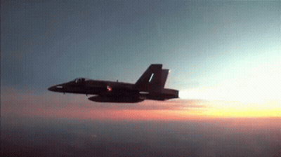 Fighter Jet Flying At Sunset GIF