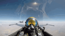 Fighter Jet Rotating On Another Jet GIF