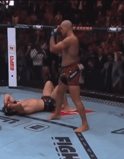 Fighter Wearing Punch Shorts Kicking Opponent GIF