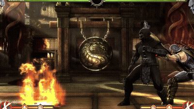 Fighters In Video Game Front Of Scorpion Gong GIF
