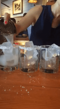 Filling In Glass With Margarita GIF