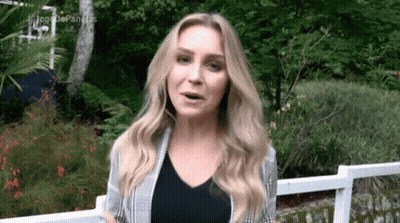 Finger Pointing At Soda Can In Sand GIF