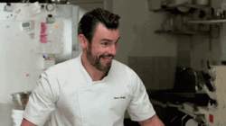 Finger Pointing Canadian Chef GIF