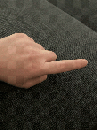 Finger Pointing Left On Couch GIF