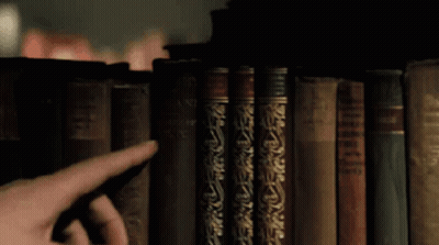 Finger Pointing To Bible GIF