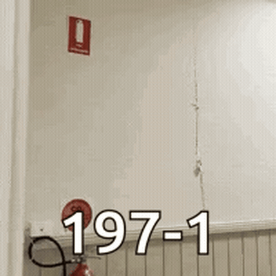 Fire Extinguisher On Shelf With 197-1 Sign GIF