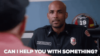Firefighter Talking To Man GIF
