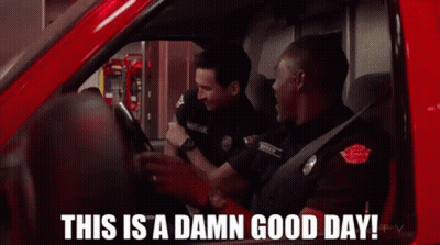 Firefighters Driving Red Truck Saying This Is A Damn Good Day GIF