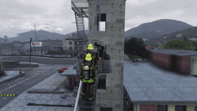 Firefighters Standing On Building Next To Fire Escape GIF