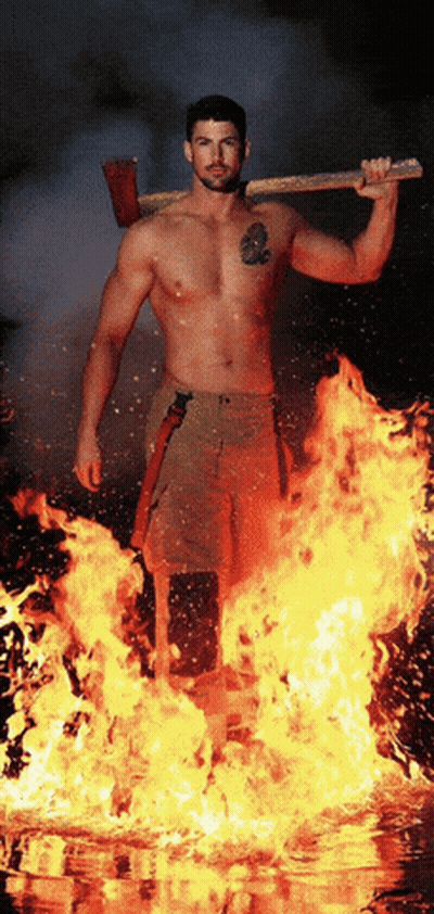 Fireman Holding Axe In Front Of Flames GIF