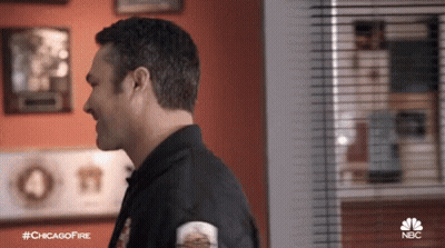 Fireman In Front Of Burning Building #ChicagoFire GIF