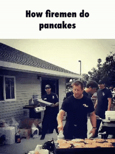 Firemen Making Pancakes Around Table GIF