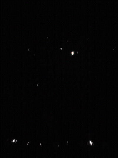 Firework Display Over House At Night GIF