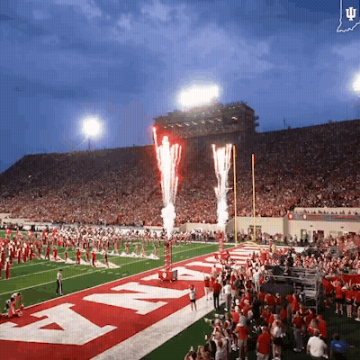 Fireworks Are Going Off In A Stadium With The Word Army On The Field GIF