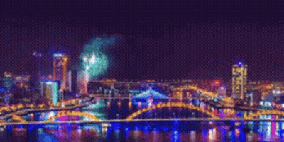 Fireworks Over City Bridge GIF