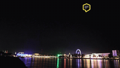 Fireworks Over Water With Yellow Speech Bubble GIF