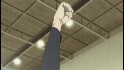 Fist Raised In Front Of Ceiling GIF